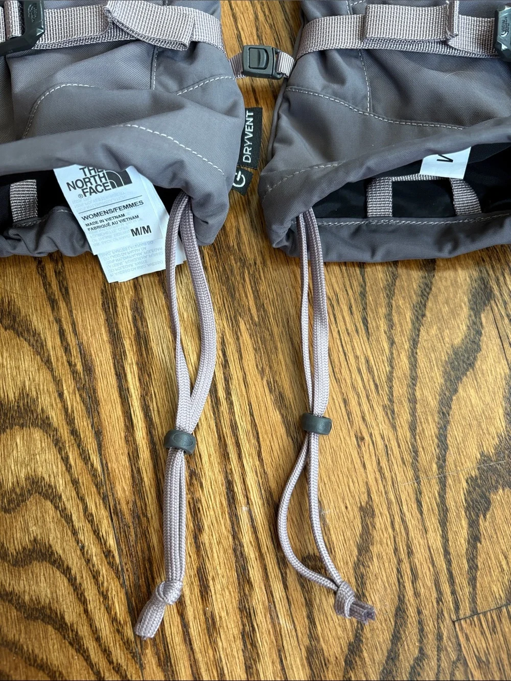 The North Face purple-grey women’s adjustable ski gloves. Excellent condition